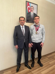 Taleh Qaraşov Avropa çempionu Elmin Əliyevi və məşqçisi Alı Ağayevi qəbul edib