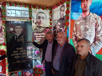 Şəhid Mirzə Axundovun anım günündə məzarı ziyarət olunub
